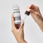 آمپول پیل شات برنج سیاه دکتر ملاکسین لایه بردار و روشن کننده پوست
