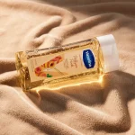 روغن بدن وازلین رایحه هلو مدل Pretty as a Peach