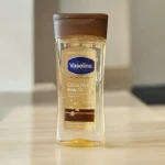 روغن بدن وازلین مدل Cocoa Radiant Body Oil with Pure Cocoa Butter حجم 200 میلی ‌لیتر